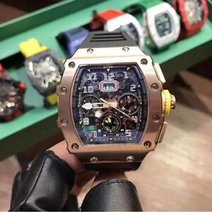 Men's Rose Gold Chronograph Watch with Black Strap and Yellow Crown